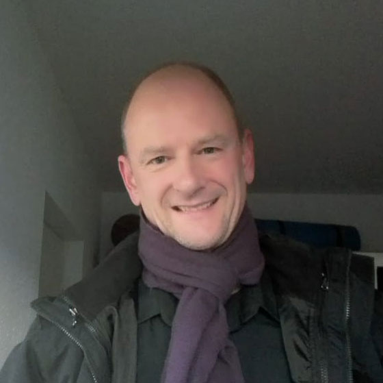 Portrait of Rolf Schwedes, German language trainer from Stuttgart, Germany, in his office.